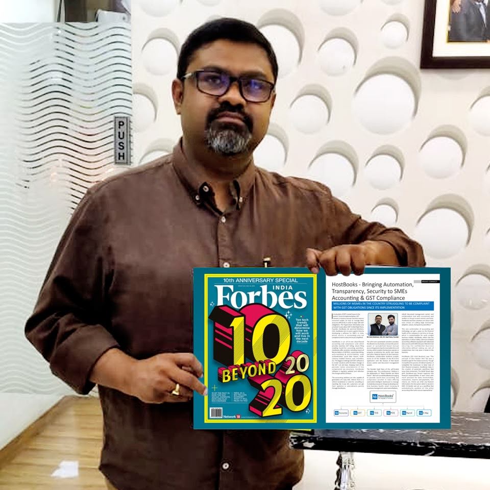 Ameet Mukherji receiving Forbes Best Entrepreneur Award